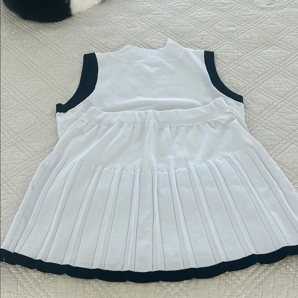 White and Black Sleeveless Pleated Dress